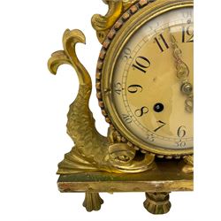 20th century - continental 8-day wall hanging Cartel clock in a carved and gilded wooden case, with a painted metal dial, Arabic numerals, minute track, five minute Arabic's and pierced gilt hands, two train spring driven movement, striking the hours and half-hours on a bell. No pendulum.