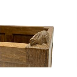 'Rabbitman' oak magazine rack with adzed panelling, the top carved with rabbit signature, by Peter Heap of Wetwang