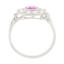 Platinum pink sapphire and diamond milgrain set cluster ring, single octagonal cut sapphire of approx 0.95 carat, surrounded by twelve old cut diamonds, with baguette cut diamond shoulders, stamped Plat, total diamond weight approx 0.70 carat