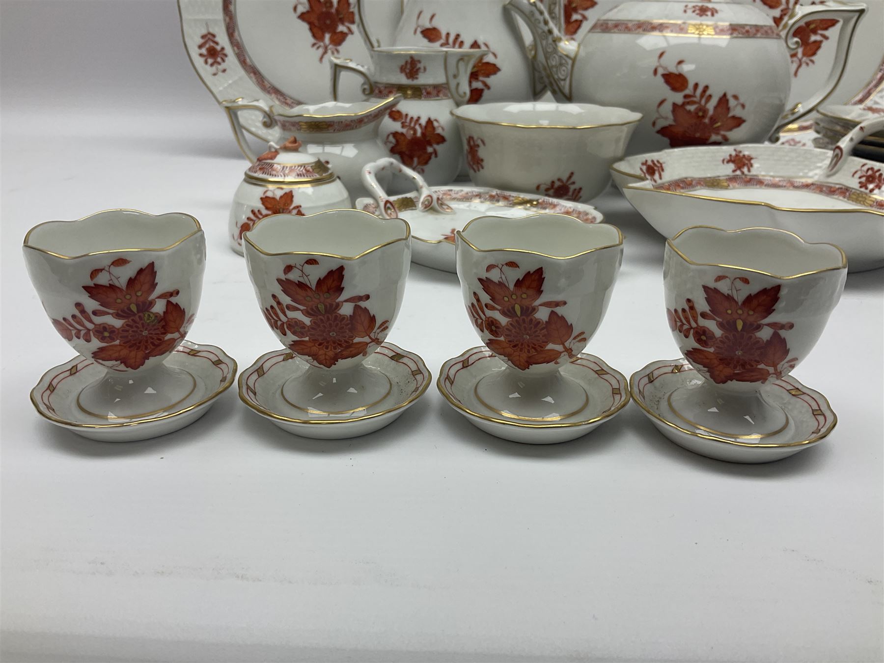 Herend Chinese Bouquet Rose pattern tea service comprising teapot, coffee pot, open sucrier, six cups and saucers, six tea plates, cream jug and stand, milk jug, two teabag holders, preserve pot, two leaf shaped dishes, four egg cups, salt & pepper pots, pair side plates and another plate