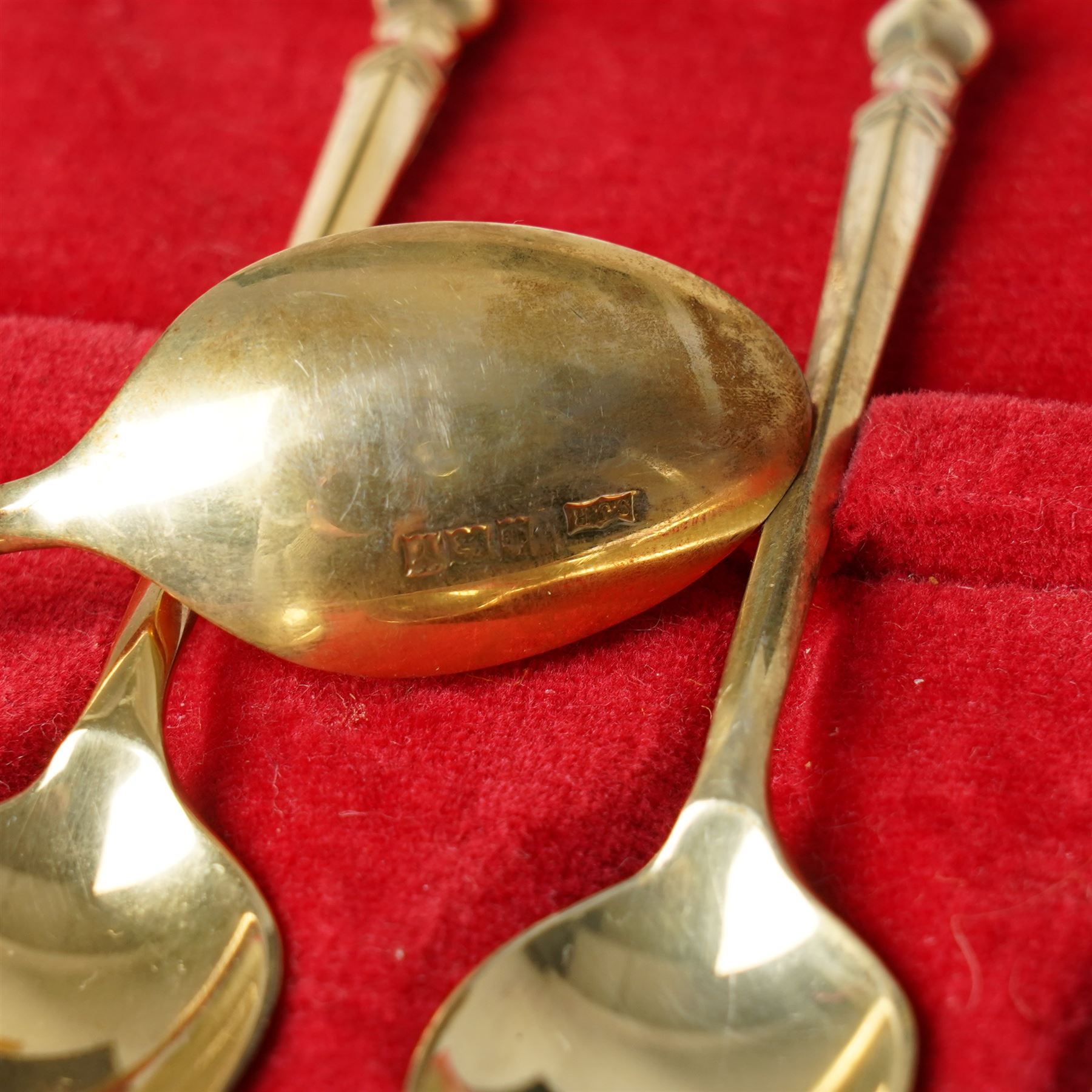 Cased set of six silver gilt coffee spoons with fox mask terminals London 1973 Maker S J Rose & Son in Garrards case