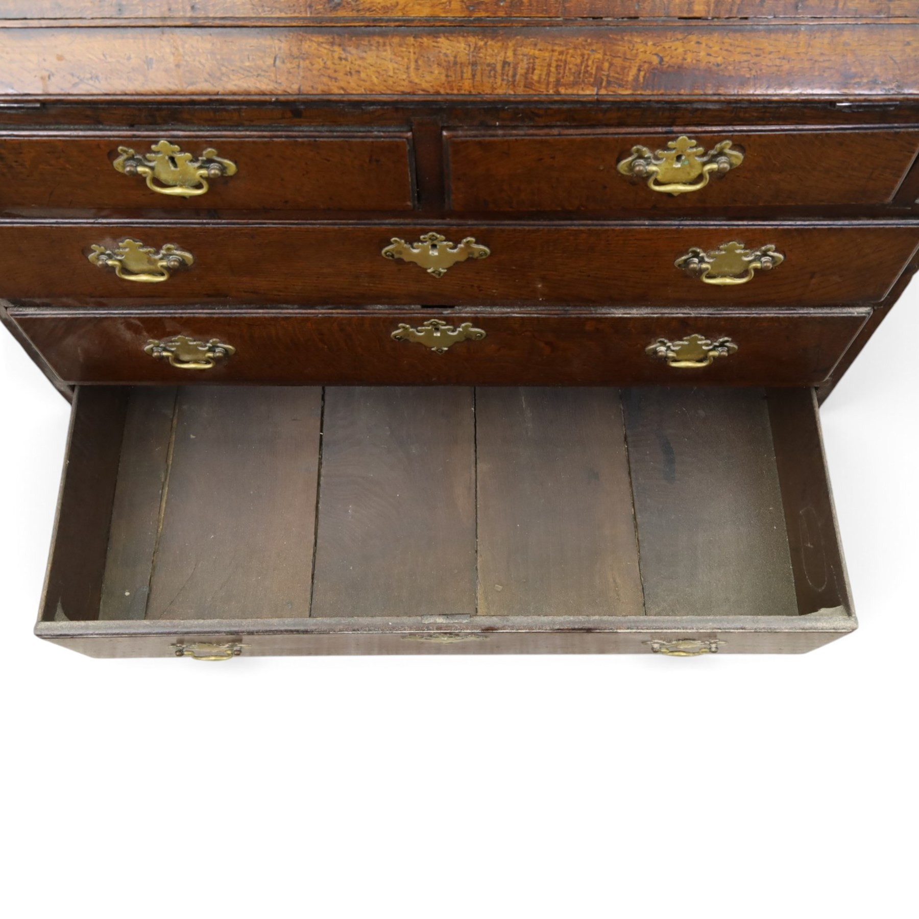 18th century inlaid oak bureau, the fall-front with central star inlay enclosing fitted interior with central cupboard flanked by fluted column correspondence drawers and pigeon holes, over two short and three long drawers, lower moulded edge on bracket feet
