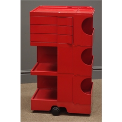  Red Joe Columbo 'boby' modular Office storage trolley, marked on base 'bieffeplast padova Italia designer joe colombo' patented with three swivel drawers shelves  and recess, signed in relief on base and on three black castors, W41, D43, H73  