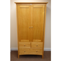   Pine double wardrobe, two doors enclosing hanging rail, two short and one long drawer, stile supports, W96cm, H188cm, D55cm  