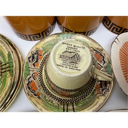 Four Portmeirion storage jars with Greek key pattern on an orange ground, together with Tams Ware tea service and other ceramics