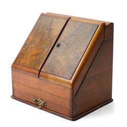 Edwardian walnut stationery casket, the dividing doors revealing a fitted interior with st...