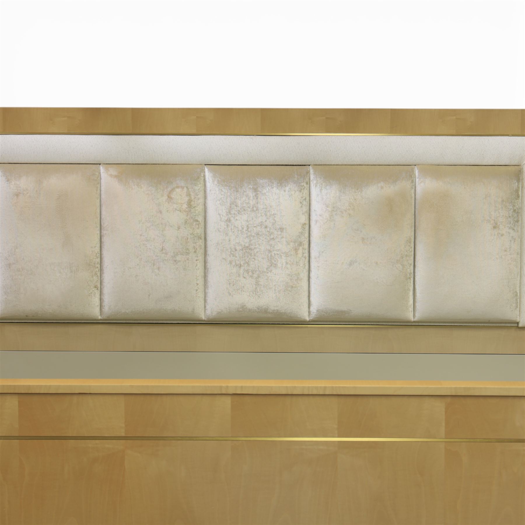 Contemporary maple and inlaid brass Emperor sized four poster bed, rectangular canopy frame with square section uprights, panelled headboard incorporating a padded upholstered inset, flanked by brass reading light fittings, low footboard with moulded panel detail, raised on square inlaid brass supports