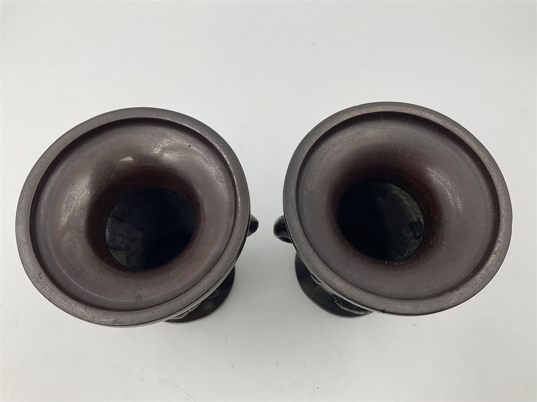 Chinese bronze vase, of baluster form with elongated neck, decorated in relief with birds amongst prunus blossom, together with a smaller pair of twin handled bronzed vases, decorated with peacocks and a blue Peking glass dish, with white metal mounted decorated with dragons, bronze vase H23.3cm