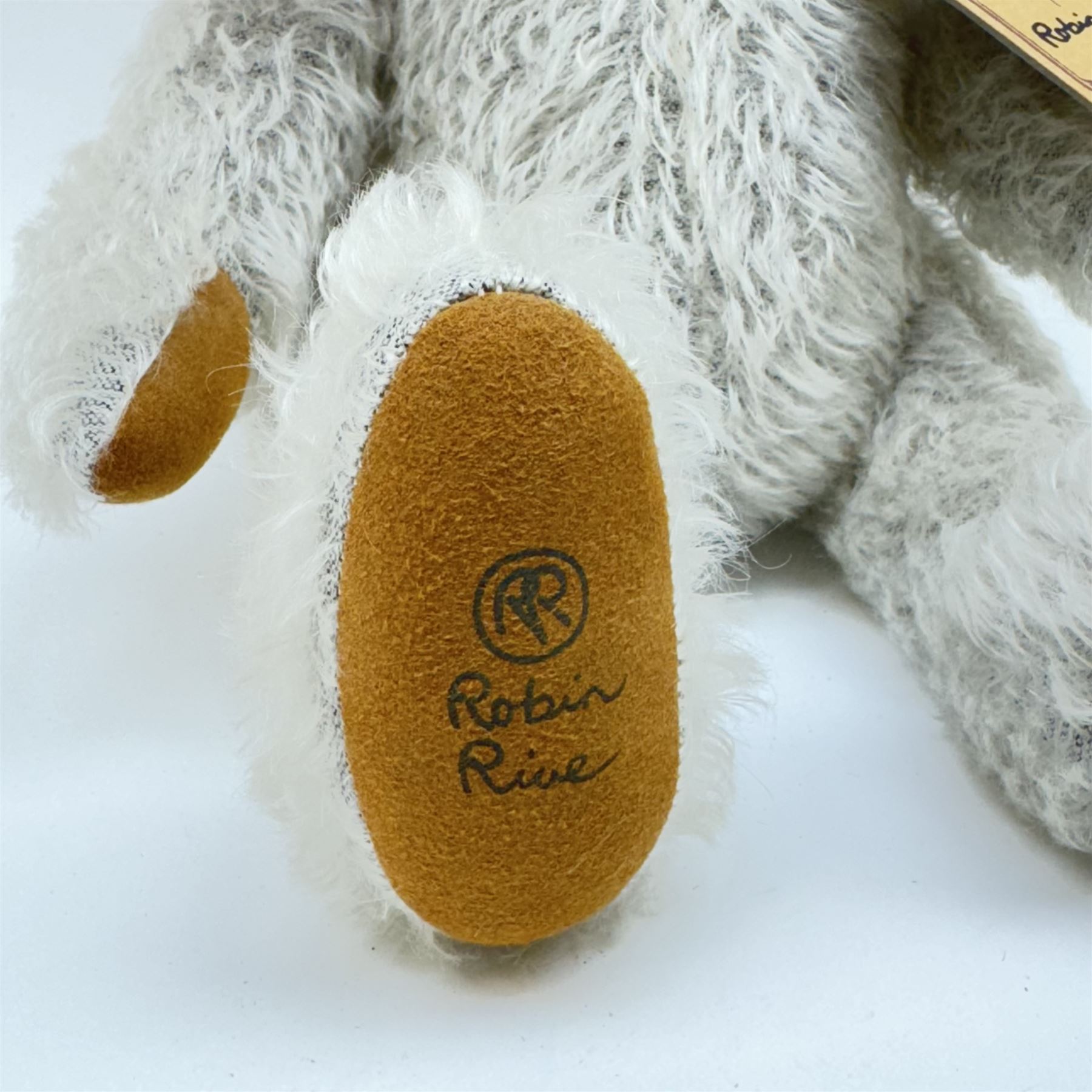 Three limited edition Robin Rive teddy bears to include 'Peace' a yellow mohair bear holding a yellow rose limited edition no.4/200, 'Tuddles' a musical grey mohair bear limited edition no.9/100 and 'Sally & Her Bear' a blonde mohair bear with crocheted teddy bear limited edition no.143/300, all with certificate tags, tallest H41cm 