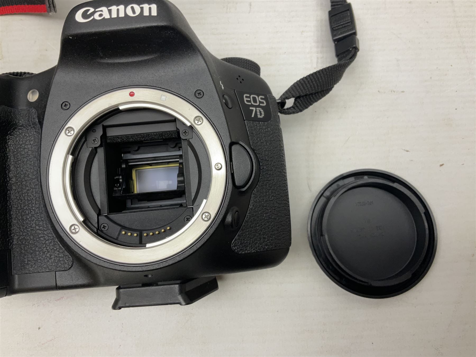Canon Eos 7D camera body, serial number 3261306344, with 'Canon Ultrasonic EF 24-105mm Macro 0.45m/1.5ft Ultrasonic' Lens, 'Canon Zoom EF 75-300, 1;4-5.6 III' lens and Teleplus Pro 300 lens, together with tripod and original camera box 