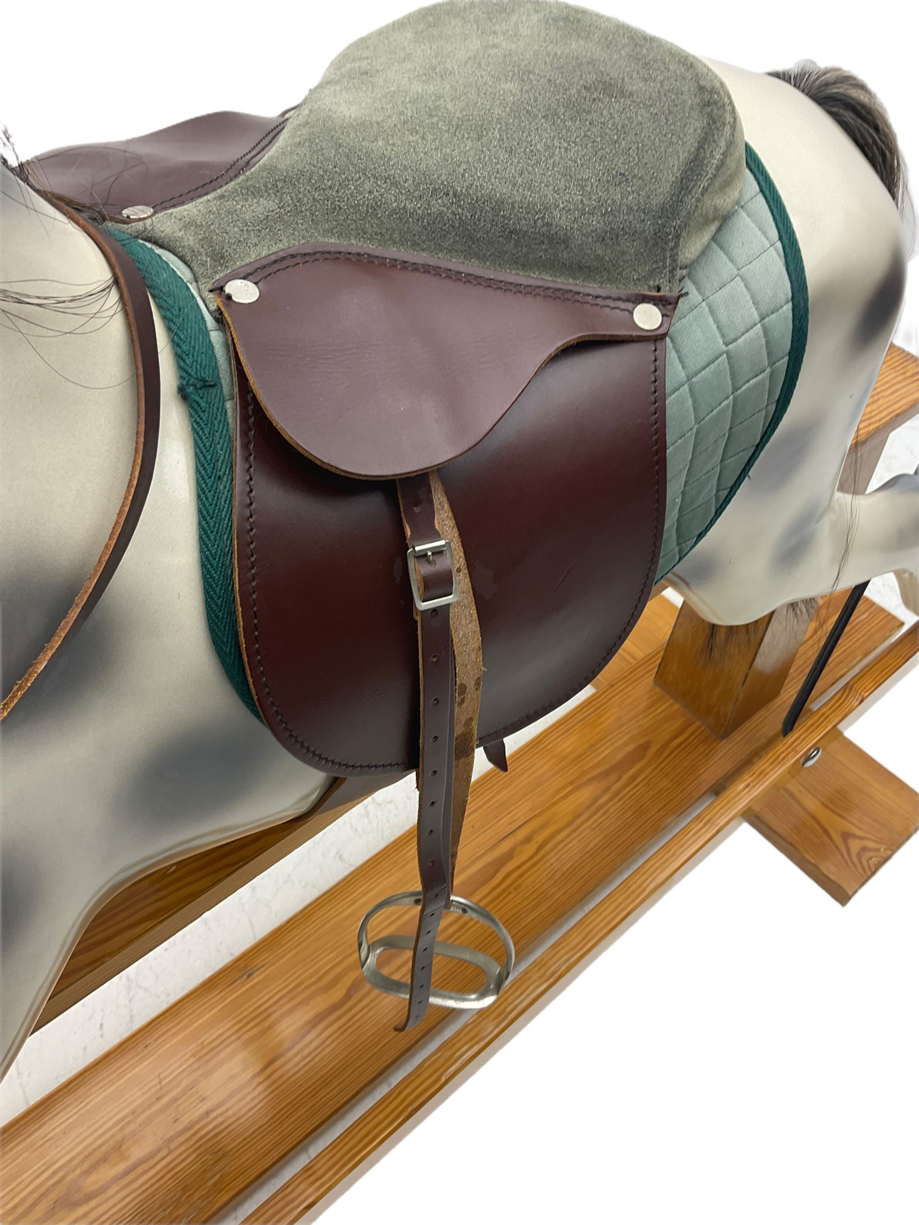 Haddon rocking horse, with tack, on pine trestle base