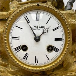 French - late 19th century 8-day gilt spelter mantle clock retailed by J Vassalli of Scarborough c1890, sculptured with an oriental 16th century representation a Mughal warrior slaying a leopard, raised on a profusely  decorated base with scroll work and splayed feet, white enamel dial with Roman numerals, minute track and steel hands, Parisian twin train countwheel striking movement, striking the hours and half-hours on a bell. With pendulum & Key.  