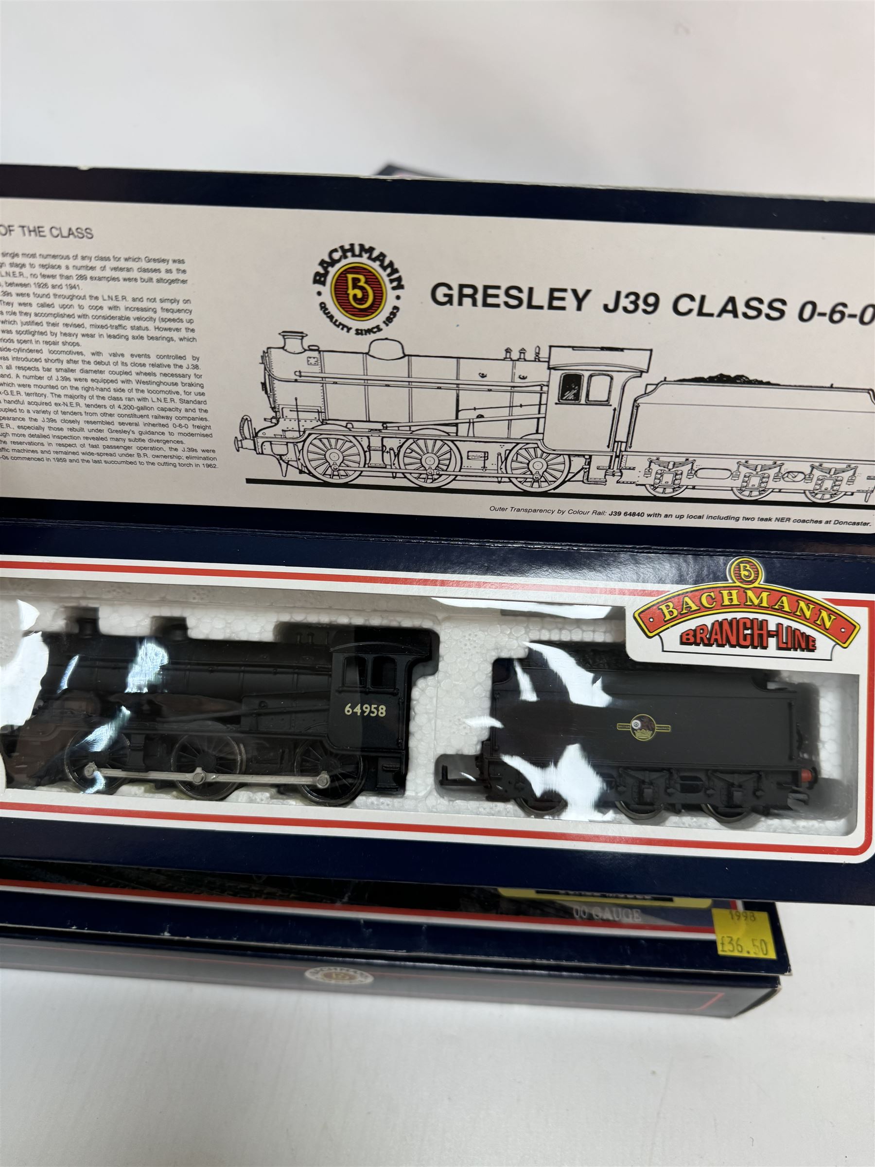 Four Bachmann Branch Line ‘00’ gauge Gresley J39 Class 0-6-0 locomotives, comprising 31851 no.64964 in BR black livery with early crest, 31851A no. 64958 in BR black with early emblem, 31852 no. 64967 in BR black with late crest and 31852A no. 64970 in BR black with late crest, all boxed 