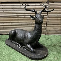 Life size laying stag, cast iron garden figure, on plinth - THIS LOT IS TO BE COLLECTED BY...