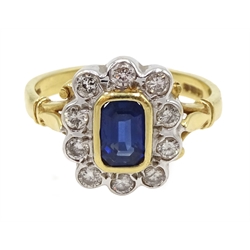  18ct gold emerald cut sapphire and round brilliant cut diamond cluster ring, hallmarked  