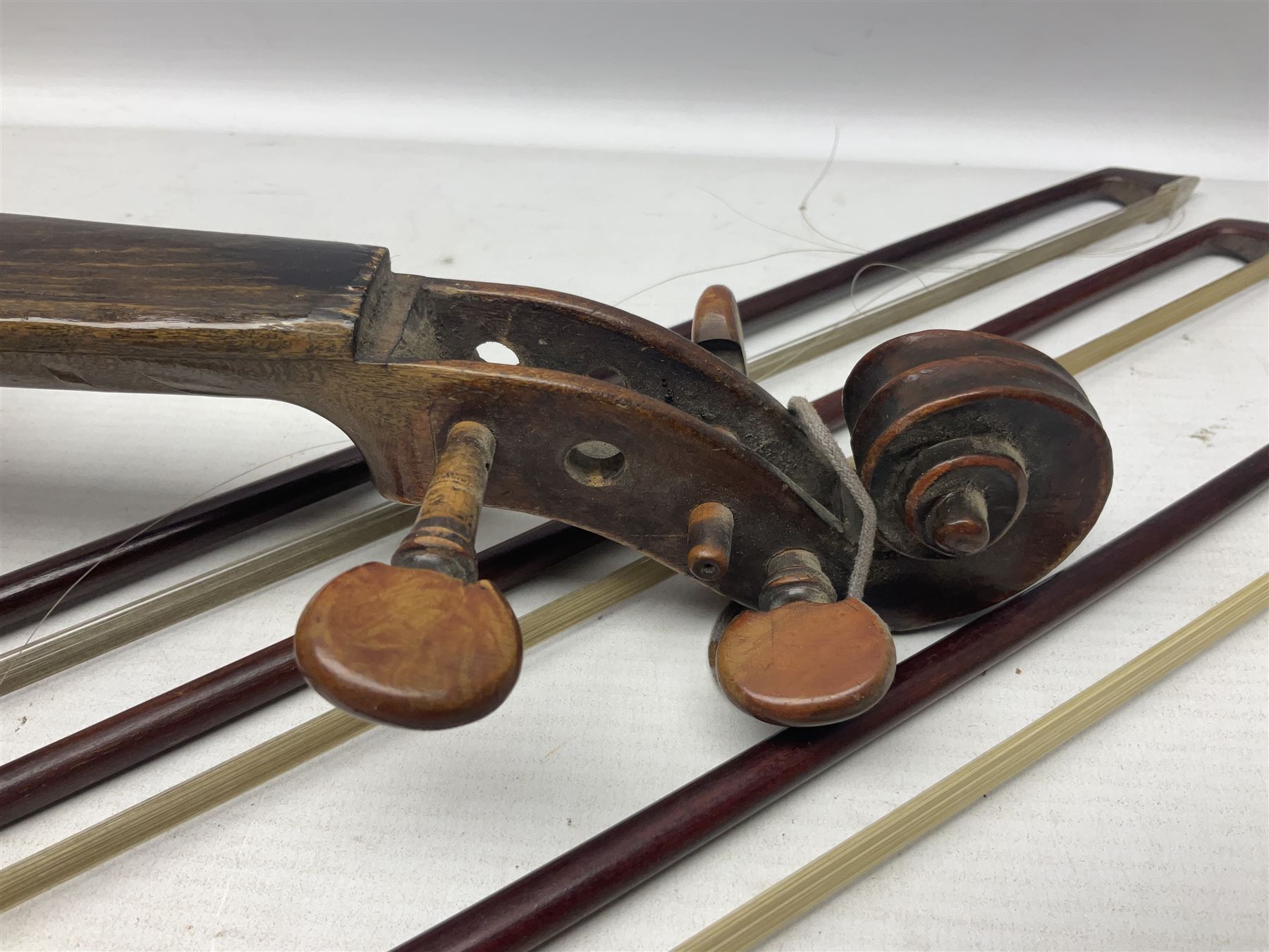 Incomplete amateur made violin c1880 for restoration and completion with 36.5cm one-piece maple back and ribs and spruce top L59.5cm; together with two brazilwood violin bows and pernambuco cello bow, all with nickel mounts (4)