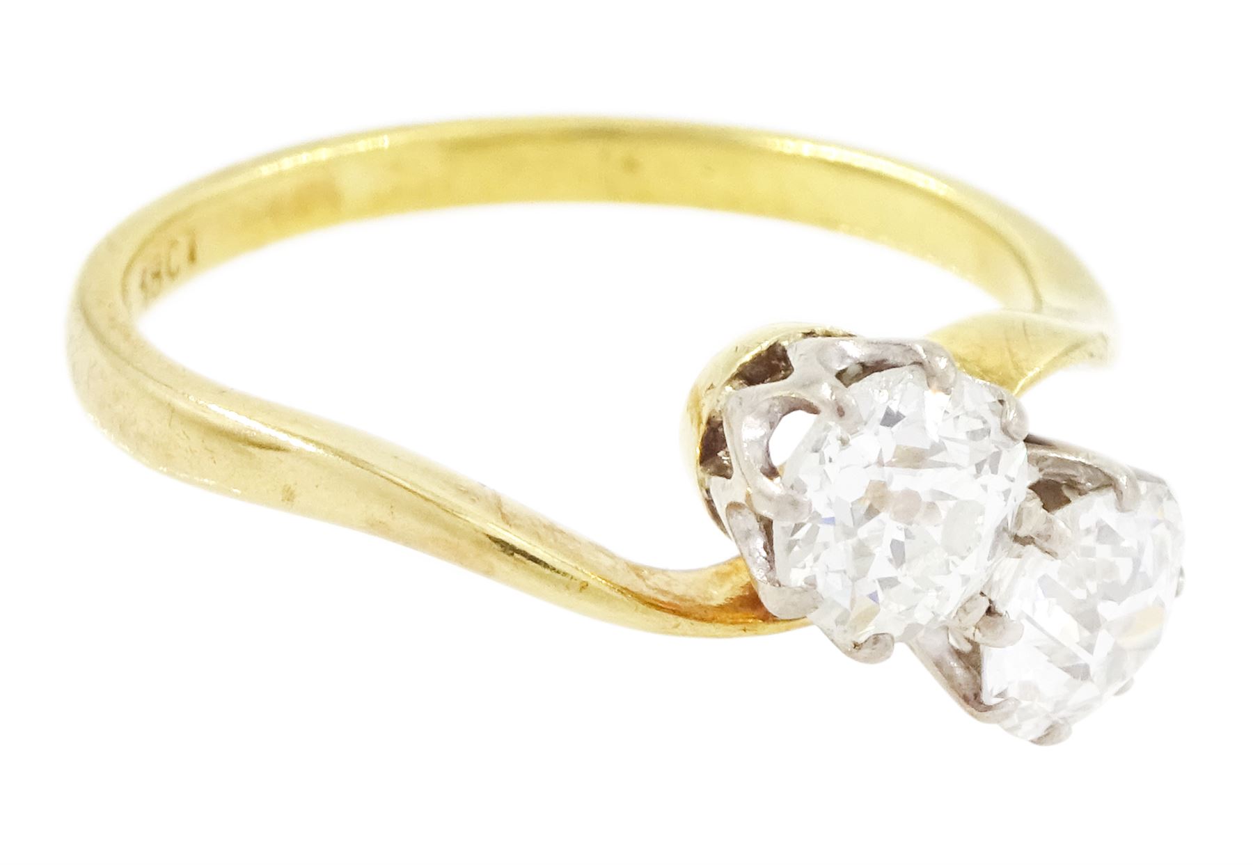 Gold diamond ring, crossover set with two old cut diamonds, stamped 18ct, total diamond weight approx 1.30 carat