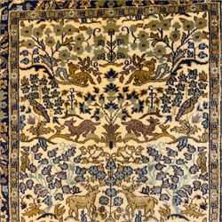 Bokhara rug, earthy ground, with repeating gul motifs, Persian pictorial rug on ivory ground with a densely patterned tree-of-life motif and symmetrically arranged deer, birds, and  other wildlife, 182x149cm & 152x90cm, (2)