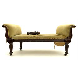 Victorian mahogany shaped window seat, lobe carved and scrolled uprights, turned tapering and reed carved supports with castors