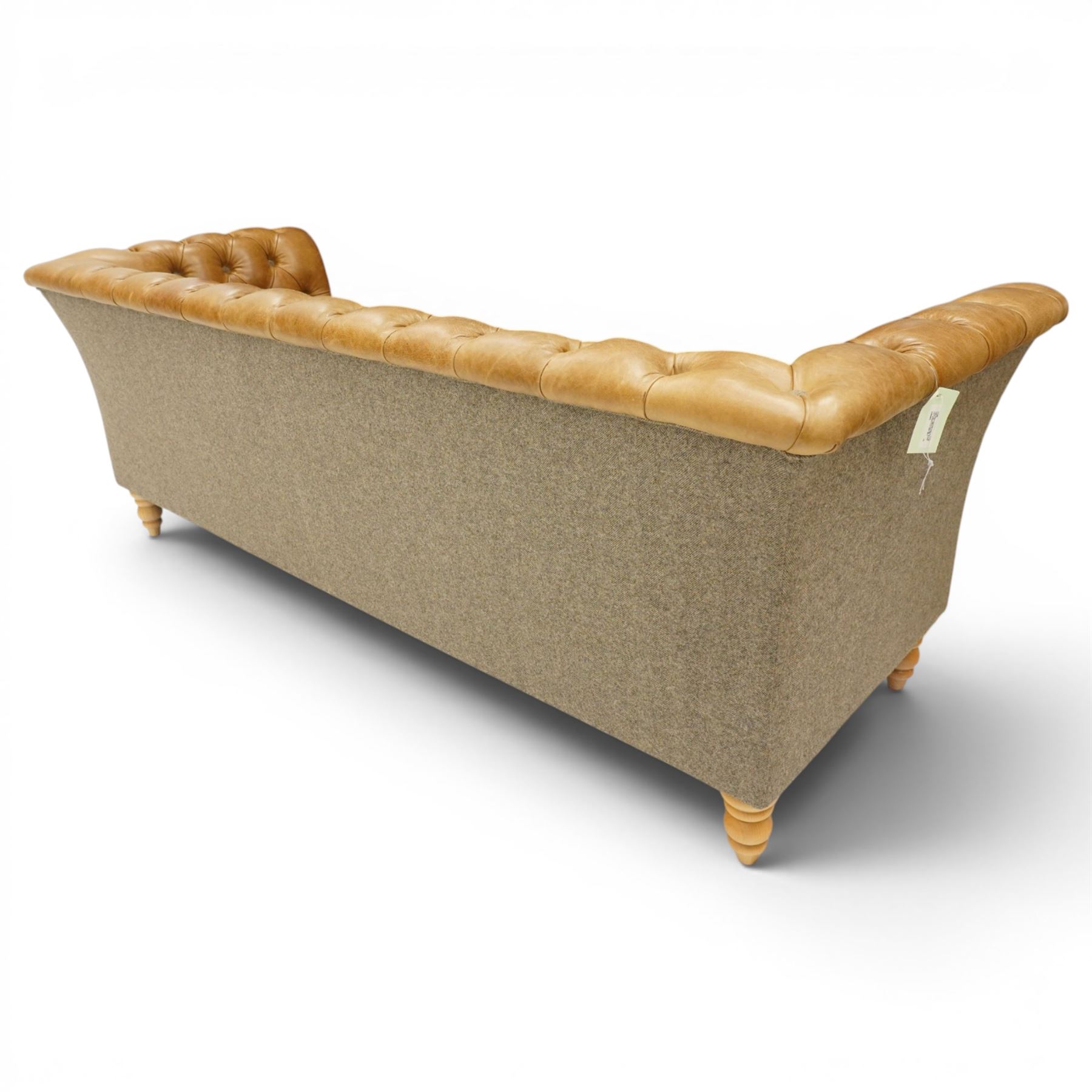 Contemporary Chesterfield design 'Caesar' three seat sofa, traditional shape with out-swept arms, upholstered in tan leather with loose seat cushions, the back, sides and buttons upholstered in chevron stitched Harris Tweed, on turned feet