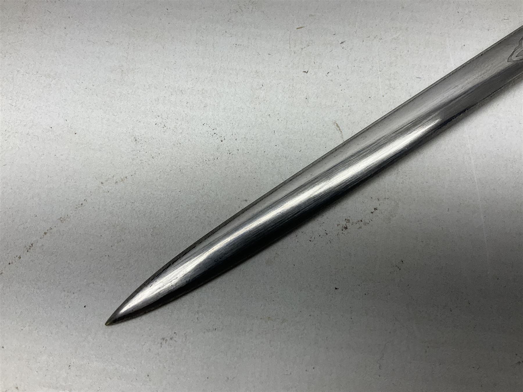 Early 20th century British Army Officer’s leather covered swagger / sword stick by Swaine & Adeney of 185 Piccadilly London; 34.5cm double edged spear point blade with etched foliate decoration and retailer’s details; stamped 'Forged in London' to the edge of the ricasso; L59.5cm overall