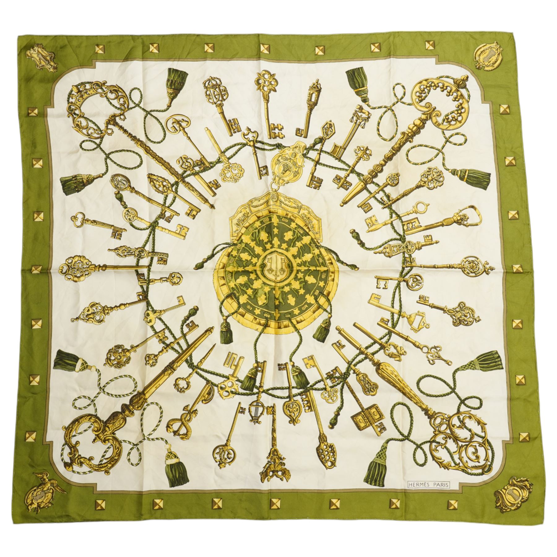 Hermes 'Les Clefs' silk scarf in green and gold colourway, designed by Cathy Latham, 86cm x 90cm 
