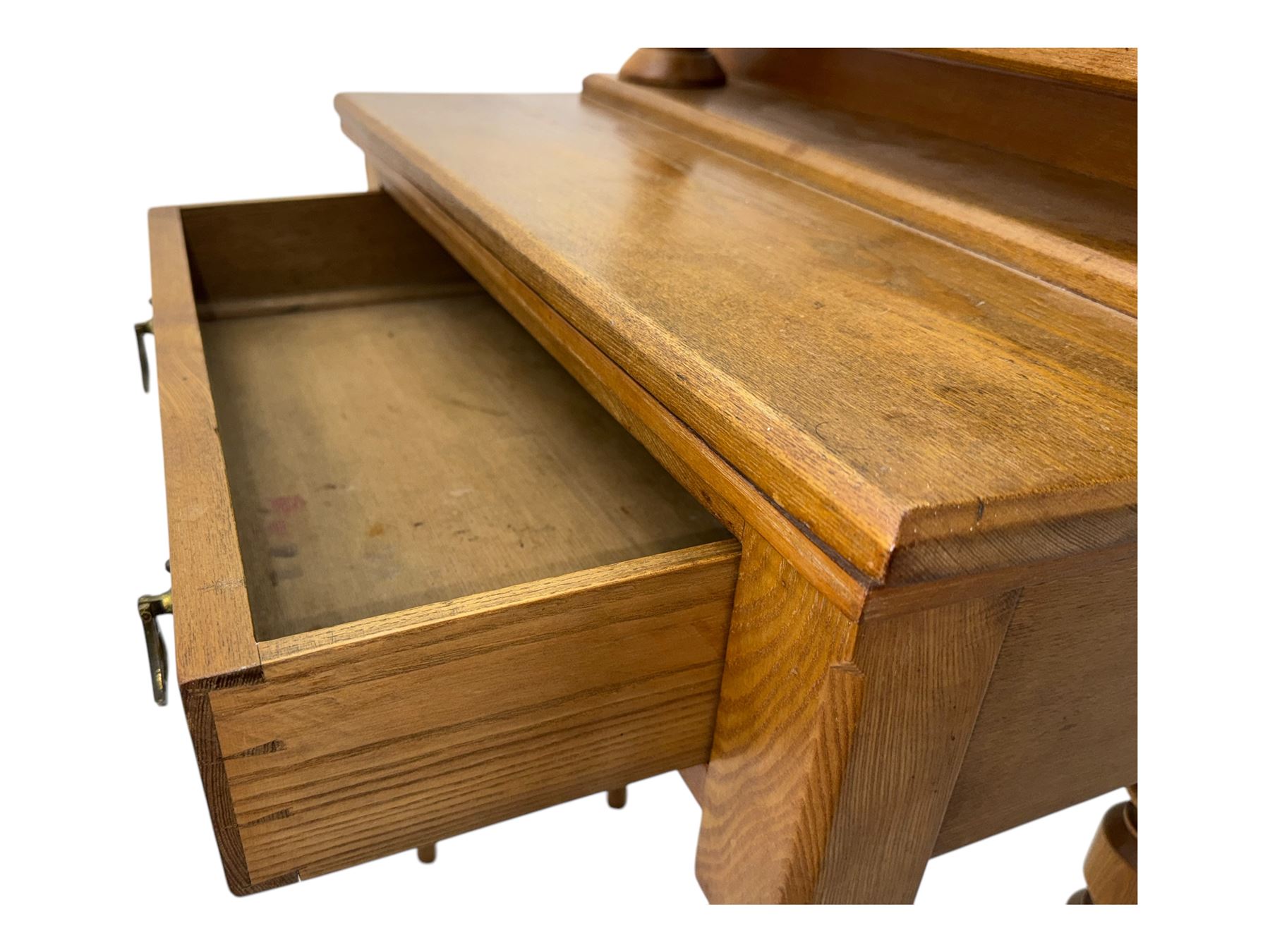 Late 19th century ash dressing table, rectangular mirror supported by two turned columns with carved finials, single drawer with brass handles, raised on turned supports