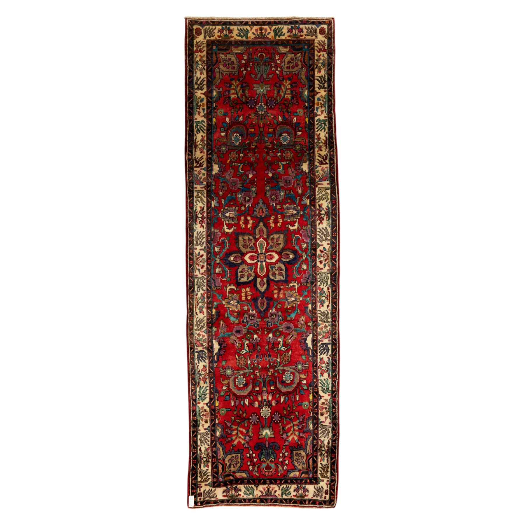 North West Persian Mahal hand-knotted runner, deep red ground, with a vertical arrangement of angular floral and geometric motifs, enclosed by an ivory border  of stylized leaves and rosettes, with guard stripes on indigo ground, cotton fringe ends 