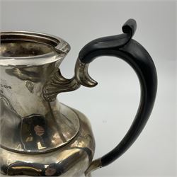 Five piece Edwardian silver tea service, comprising teapot and coffee pot, each with ebonised scroll handle, tea caddy with hinged cover, twin handled open sucrier, and milk jug, each of rounded bombe form, upon four paw feet, hallmarked William Adams Ltd, Birmingham 1904 and 1905, coffee pot H26cm
