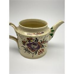 18th century creamware teapot, probably Leeds, with reeded entwined handle and floral finial to the cover, the body with hand painted polychrome decoration of figure to one side, and floral spray to the other, collectors paper label beneath inscribed Leeds Pottery, H11.5cm