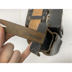 WW2 German 'SS' leather belt with six pouches (one containing unused field bandage) and buckle inscribed 'Meine Ehre Heifst Treue'; belt marked 0/0836 0029