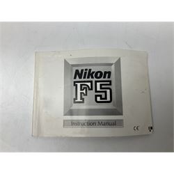 Nikon F3T camera body, in champagne/ titanium colourway, serial no. T8215031, with 'Nikon Nikkor 50mm 1:1.4' lens, Nikon MD4 motor drive, serial no. 156592 and Nikon MK-1 Firing range converter, all with original boxes 