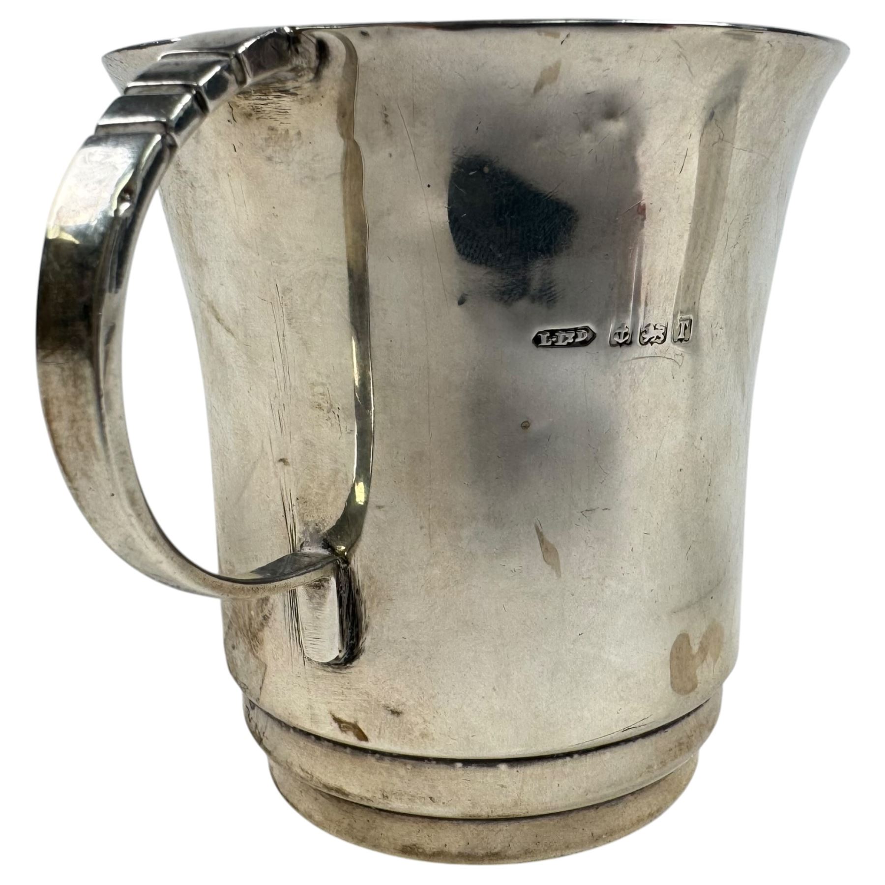 Silver christening mug and napkin ring, both hallmarked 