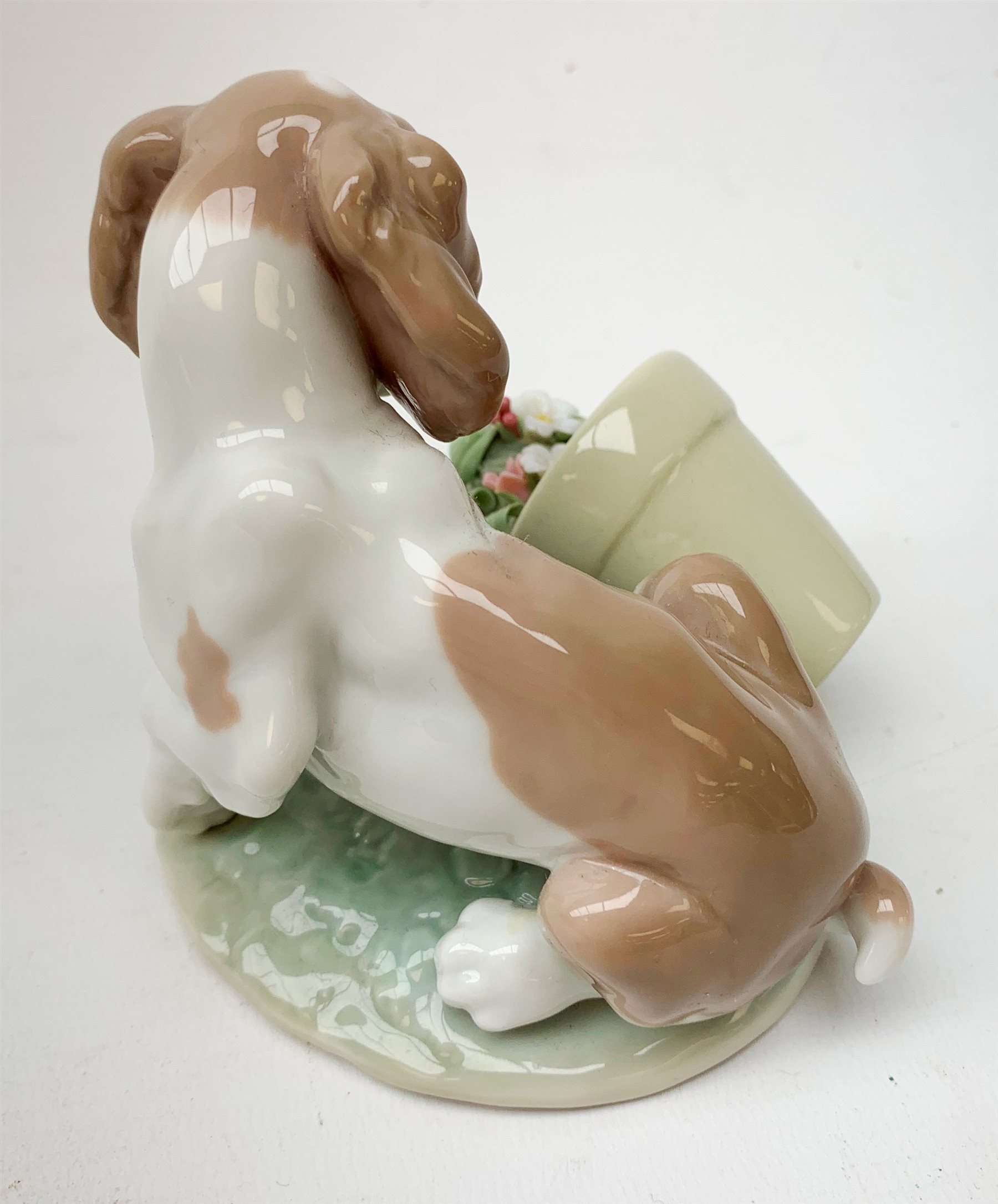A Lladro figurine, 'Barrow of Fun' Model 5460, H20.5cm, together two further Lladro figurines, 'Litter of Fun' Model 5364, and 'It wasn't me' Model 7672. 