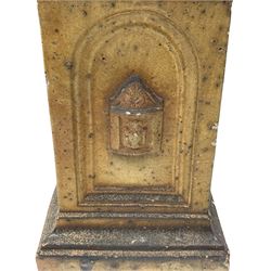 Victorian salt glazed terracotta garden urn on plinth, the Campana shaped urn with foliate decoration over gadrooned underbelly, the plinth of square tapering form, each side with recessed moulded archway decorated with urn cartouches, stepped and moulded skirt base