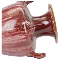 Linthorpe Pottery, pair of twin handled vases, with a purple glaze, H20cm