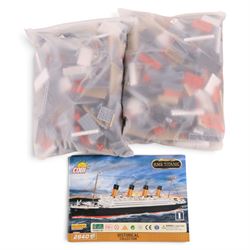 Eighteen Cobi Bricks model kits, including 1912 RMS Titanic and  Historical Collection aircraft set, unboxed with instructions 