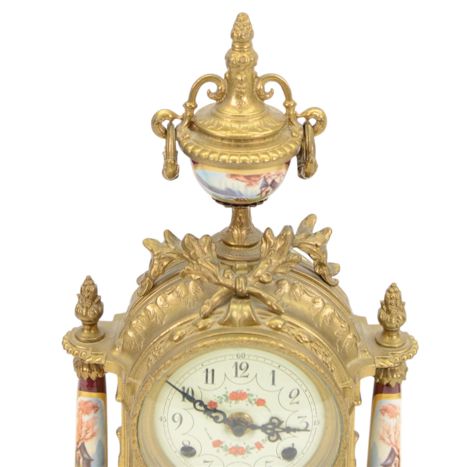 Continental-20th century clock garni in a mid 19th century style case, with porcelain panels and dial, spring driven two train movement with a floating balance escapement, striking the hours and half hours on two bells. With conforming urns. 