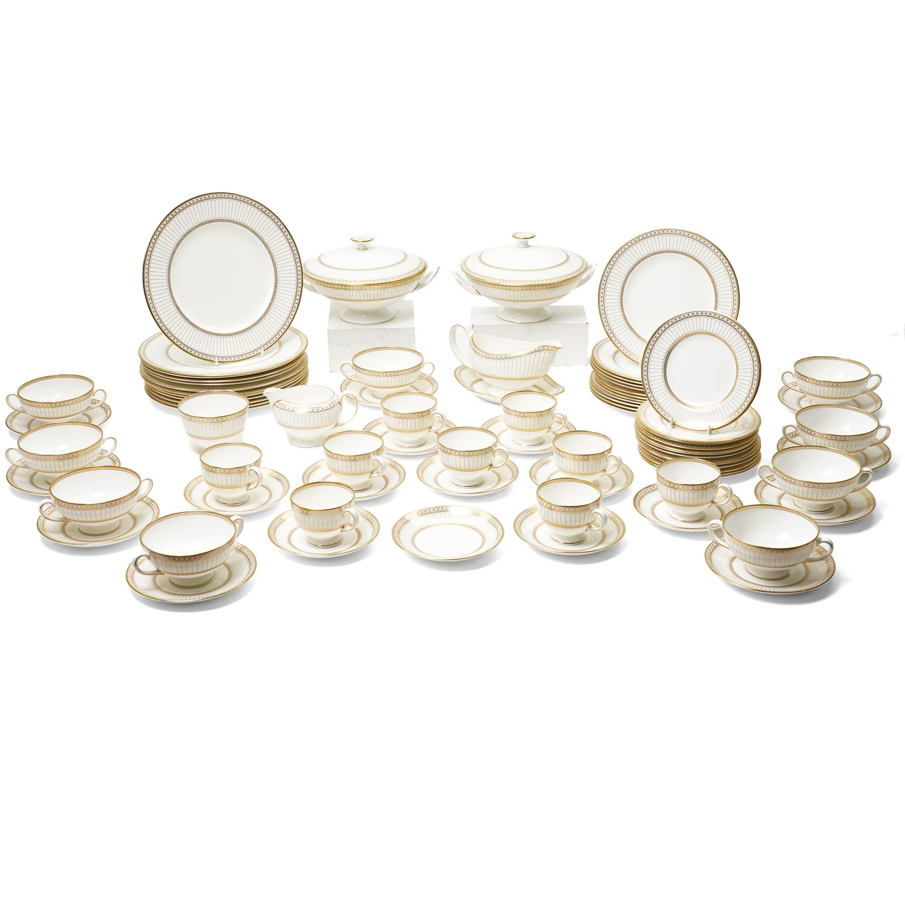Wedgwood 'Colonnade' pattern dinner and tea service comprising twelve dinner plates, twelve dessert plates, nine soup bowls and stands, pair of covered vegetable dishes, sauce boat and stand, eight tea cups and saucers, thirteen tea plates, milk jug and sugar bowl