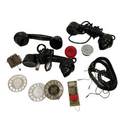 Three Bakelite telephone receivers, and other assorted rotary telephone parts