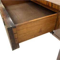 Regency rosewood sofa table, drop leaf rectangular top with rounded corners, fitted with two drawers and two opposing false drawers, raised on dual turned columns terminating in splayed feet united by turned stretcher, on brass cups and castors