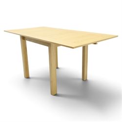 Contemporary light oak extending dining table, the square top with pull-out and fold-over action, raised on square supports
