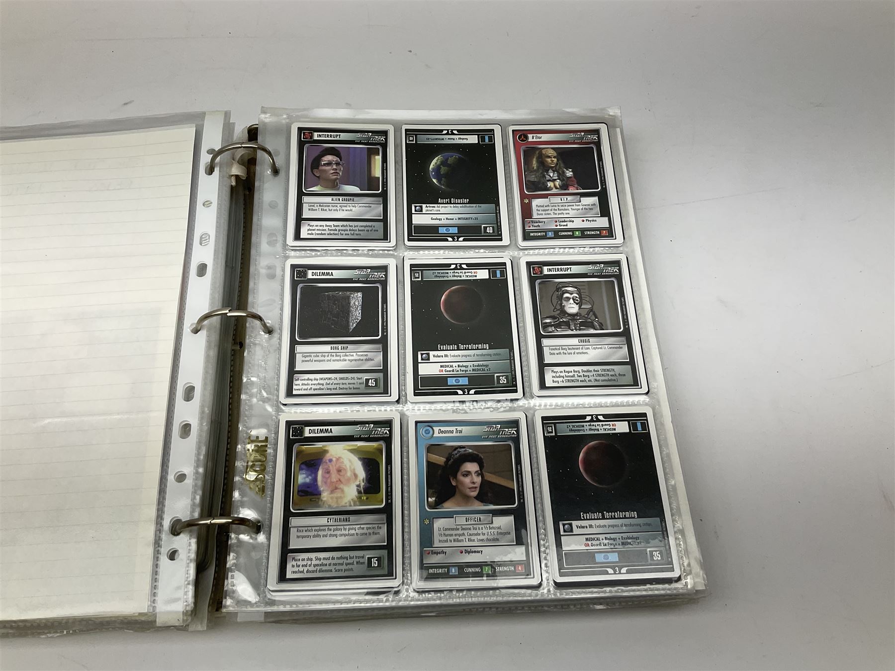 Collection of Star Trek collectors cards to include ‘Alternate Universe’ and ‘Q Continuum’ series, Star Wars cards etc housed in white album
and Harry Potter, Disney and other loose examples