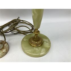  20th century gilt metal and onyx four branched candelabra upon a circular base, and onyx table lamp in the form of an urn, tallest example H48cm