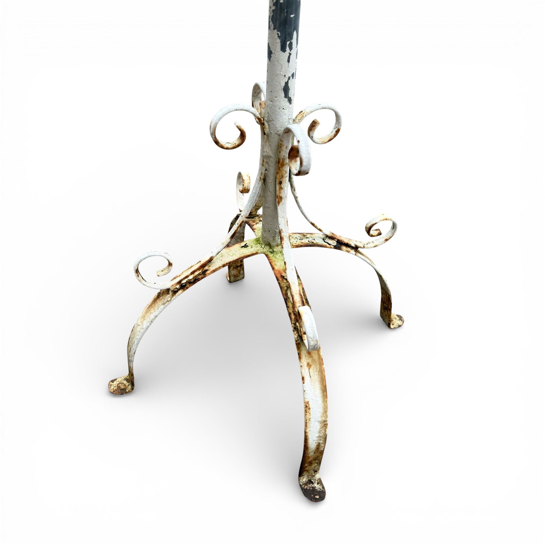 Two plant stands in a weathered white finish with wire baskets