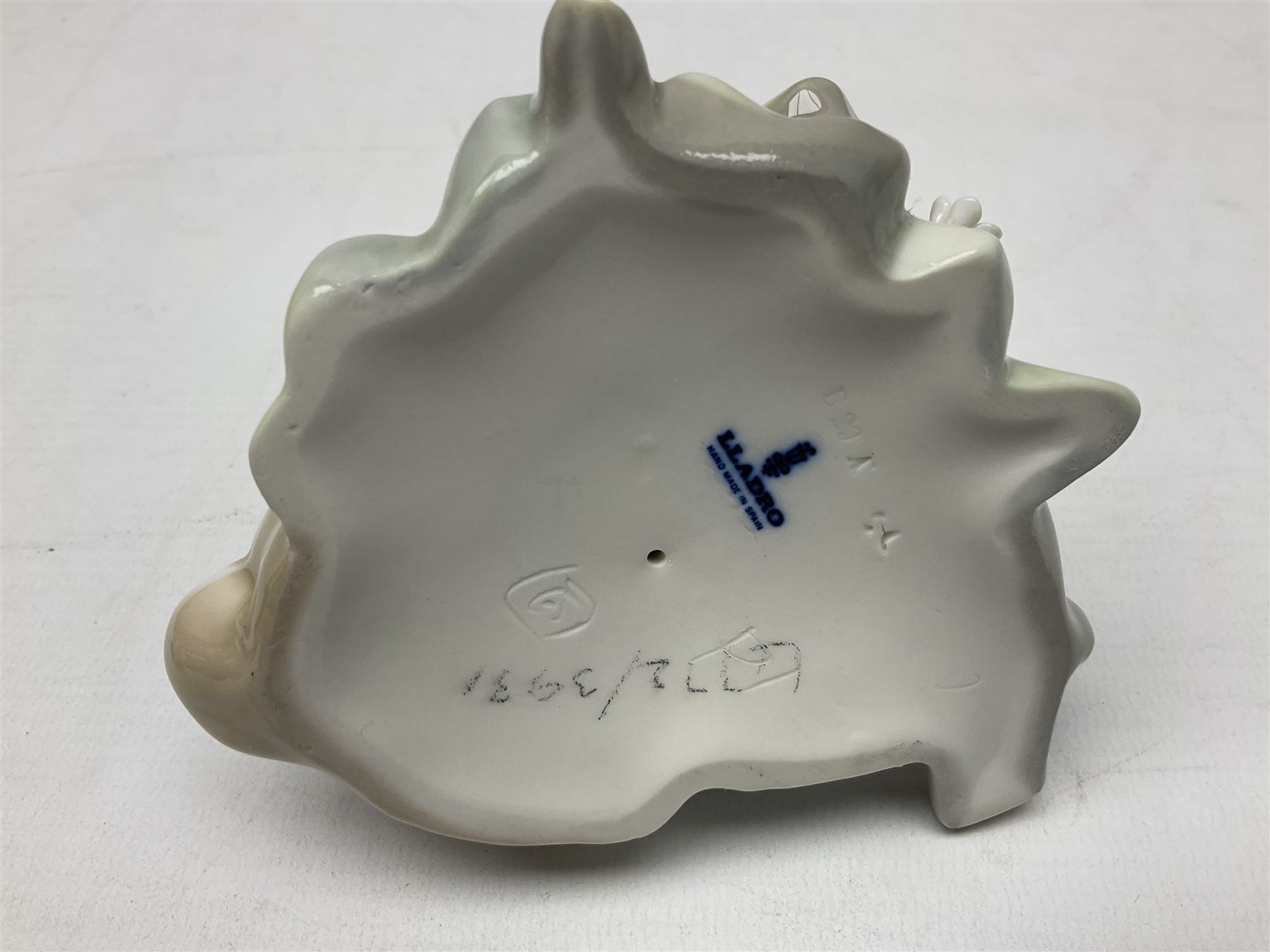 Six Lladro figures, comprising Naughty Dog no 4982, Best Friend 7620 and My Buddy no 7609, Kitty Confrontation no 1442, It Wasn't Me no 7672 and Rabbit Eating no 4772, three with original boxes, largest example H22cm