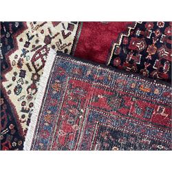 Persian Kurdish rug, blue ground field decorated with various stylised motifs and overlapped lozenge medallion, repeating guarded border