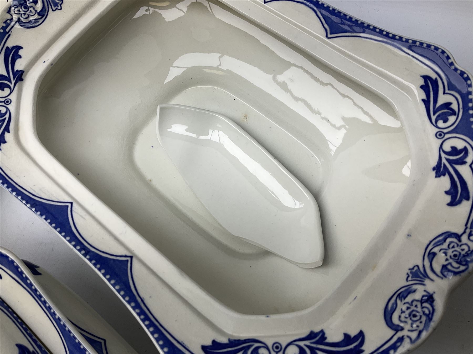 Burgess and Leigh Middleport pottery dinner wares decorated in the ‘Milford’ pattern, to include lidded tureens, graduated meat plates, dinner plates etc 