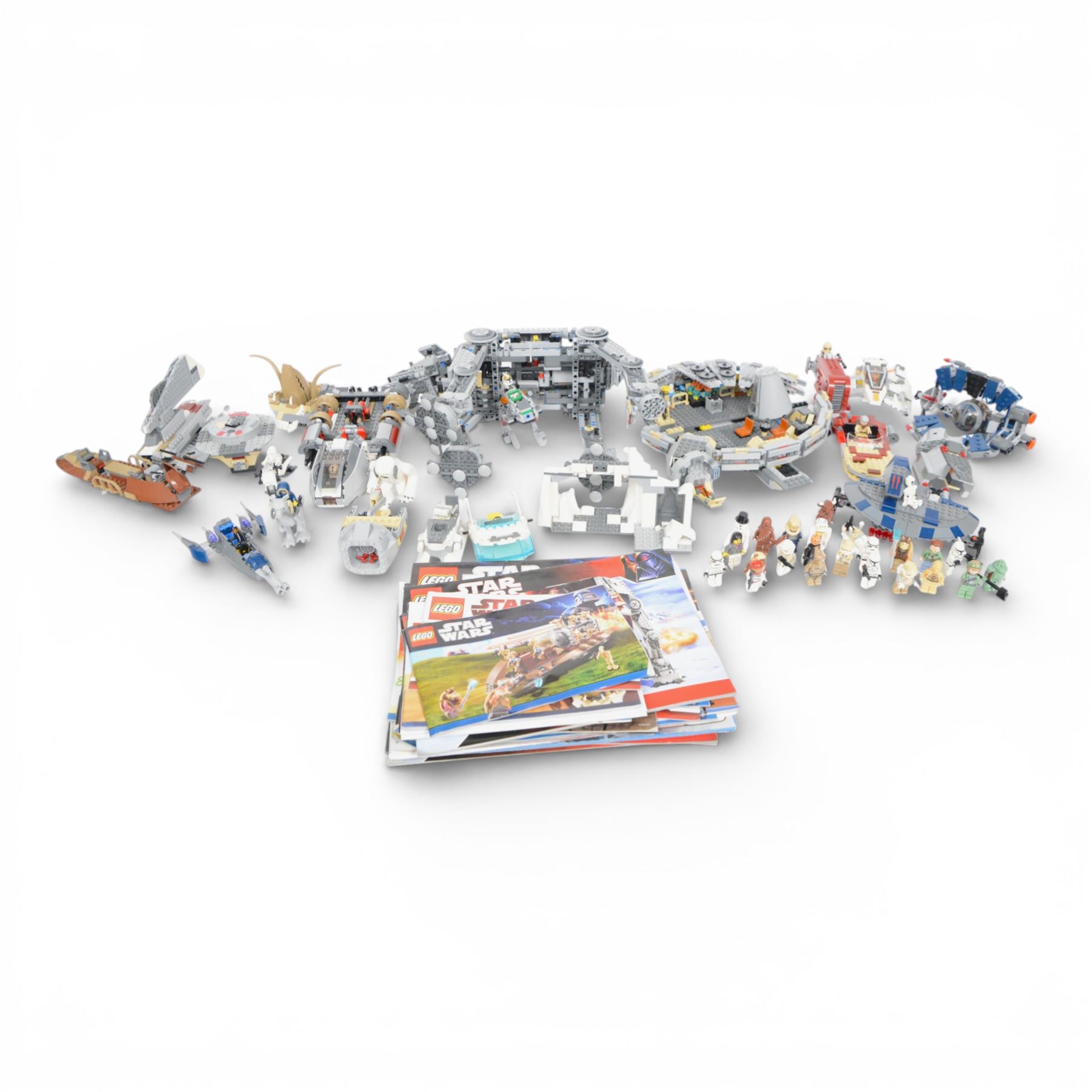 Collection of partially built Lego Star Wars models, including Motorized Walking AT-AT no. 10178, Hyena Droid Bomber no.8016, Emperor Palpatines Shuttle no. 8096, Jabbas Palace no. 4480 and Millennium Falcon no. 4504, etc together with a quantity of Lego Star Wars minifigures, loose parts and instruction booklets for Lego Star Wars sets