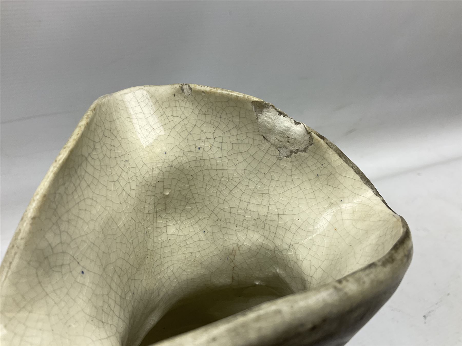 19th century and later Toby jugs comprising Staffordshire Punch and Judy jugs, Victorian 'I am on the black list' jug, two jugs in the form of Toby with a jug of beer (5)